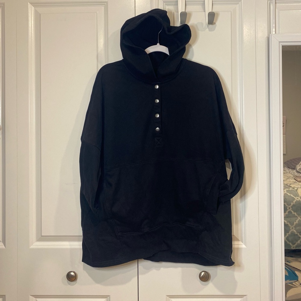 Extra large black hoodie,  buttons snap on top pockets in the front